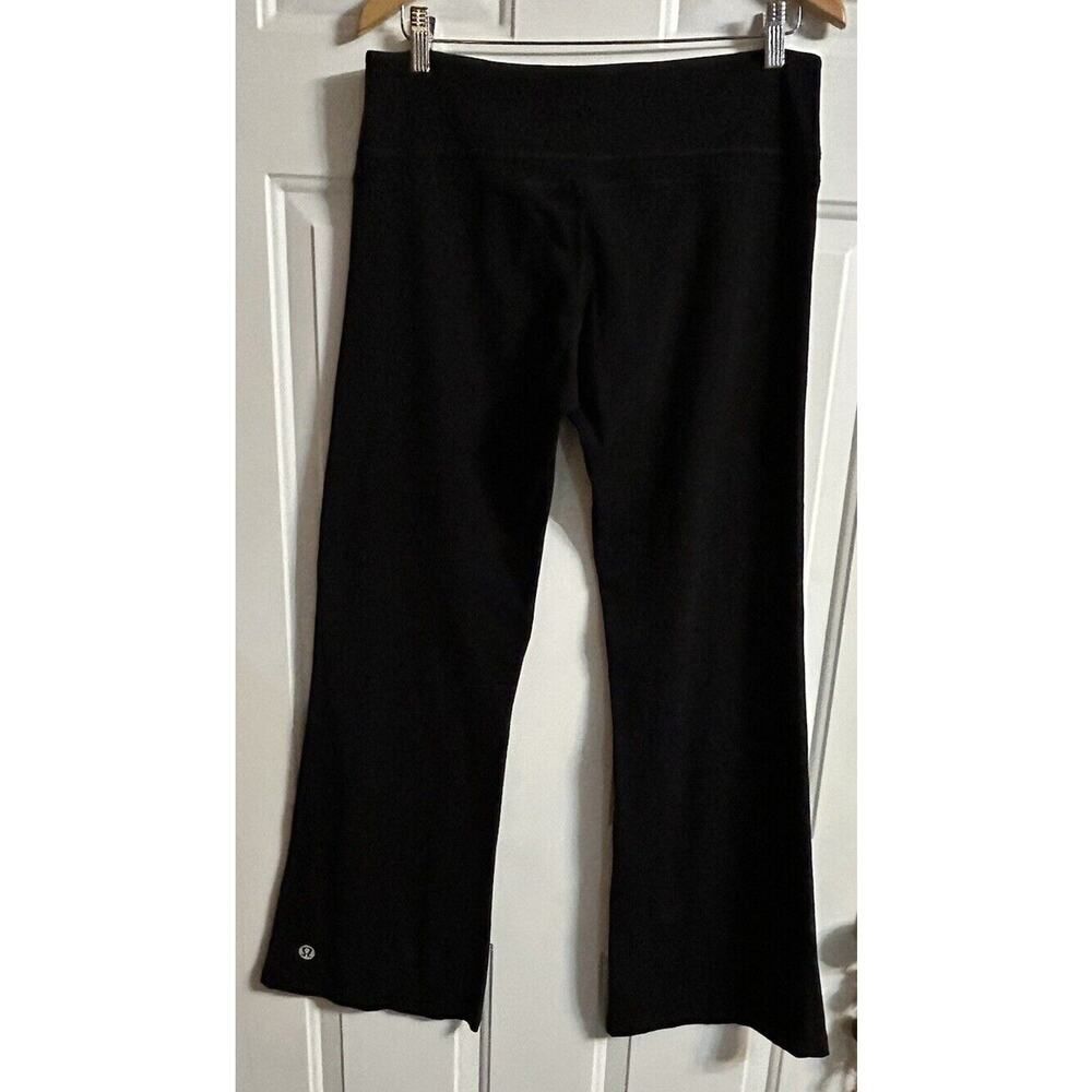 Lululemon Pants Women’s 32 X 30 1/2 Black Stretchy Logo Back Of Lower Left Leg